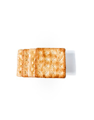 Stack of crispy cracker with a sprinkle of sugar and the other side with full of cheese coating. The taste is sweet. Isolated on a white background