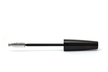 Black mascara application brush closed up isolated on white