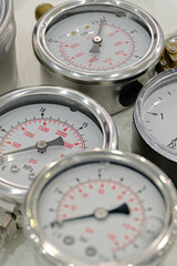 Several assorted pressure gauges