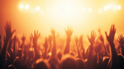 A lively crowd with raised hands at a concert or festival, illuminated by warm, golden lights, exuding energy and excitement.