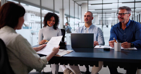 Young Woman Sitting At Interview