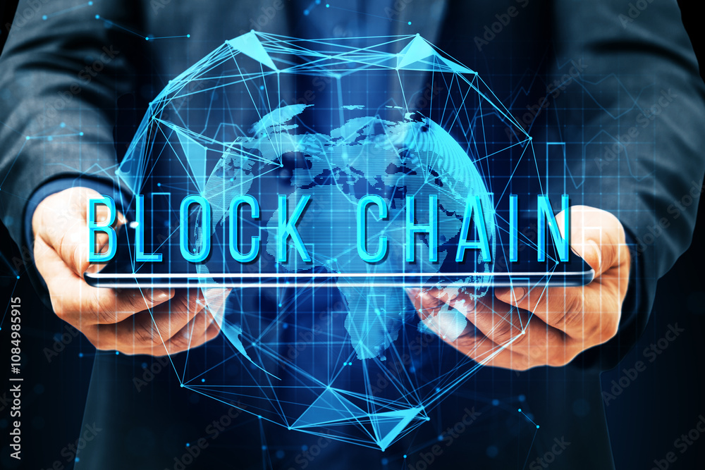 Poster Businessman holding a tablet with a holographic blockchain world map on a digital background. Concept of blockchain technology.