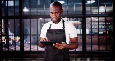 Restaurant Owner And Manager In Front