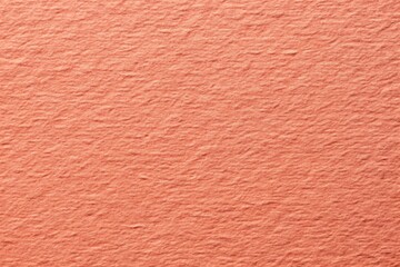 Fototapeta premium Rough grain paper texture with pastel coral background