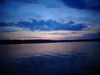 sunset over the lake during summer 