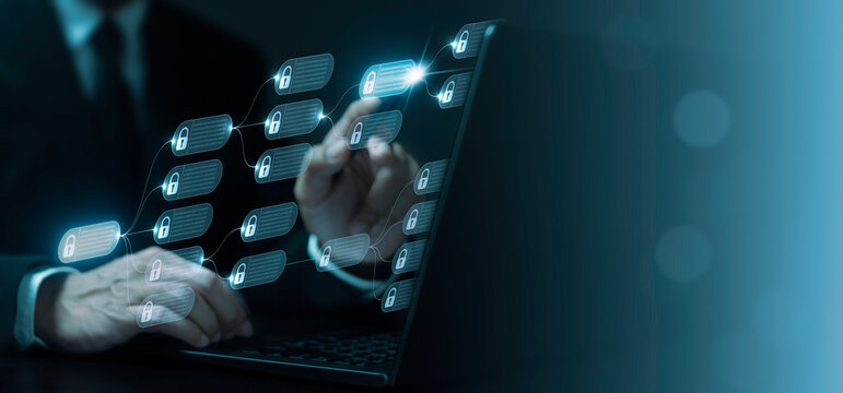 Man using laptop to work with blockchain technology data for payment and transaction system to secure business network. Digital finance and cryptocurrency concept of cyber security. - Powered by Adobe