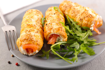 puff pastry filled with salmon and creamy cheese, festive appetizer, healthy eating