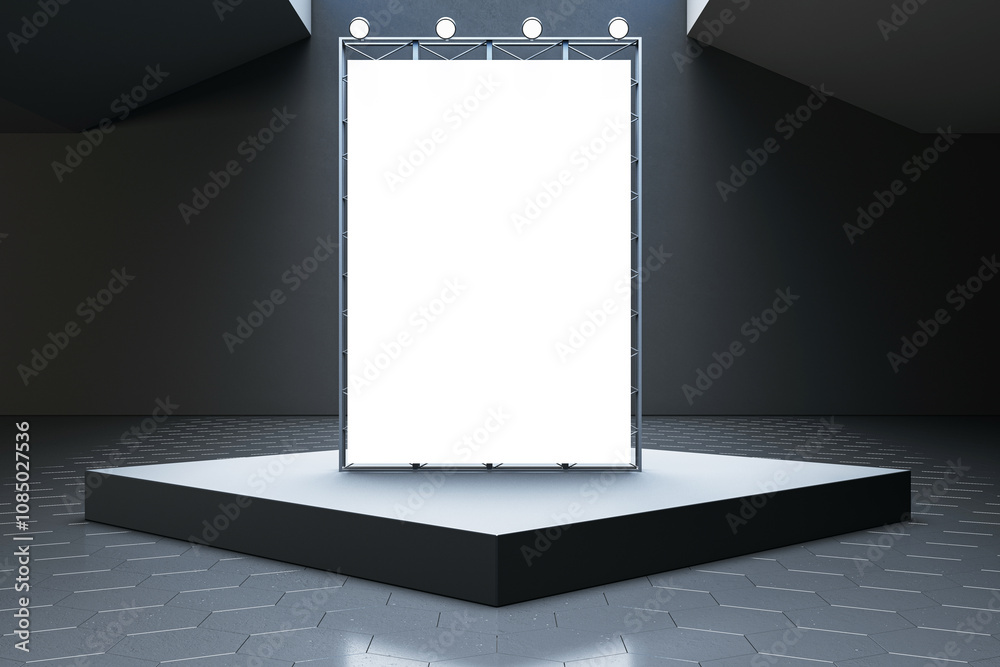 Poster modern stage setup with a large blank panel for presentations or exhibits in a dark interior space w