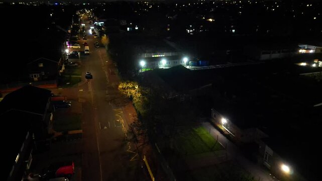 Aerial Footage of Illuminated Luton City, Barton Road A6 at Cold Night. High Angle View was Captured During Rainy and Cloudy Night over England UK. Captured with Drone's Camera on November 16th, 2024