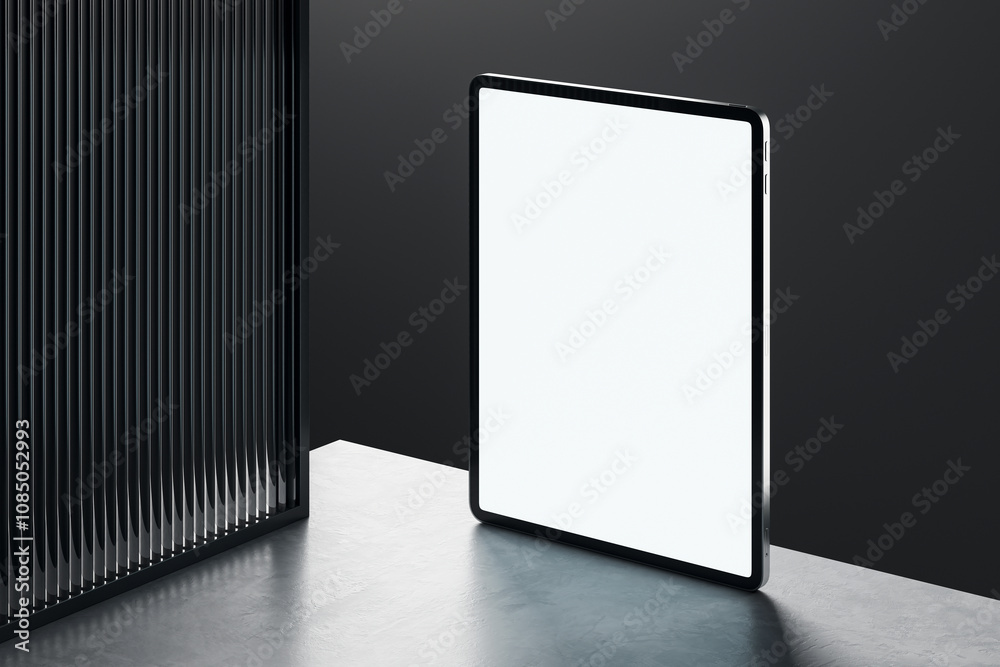 Aufkleber tablet mockup with blank screen standing on a modern surface, next to a dark textured wall in a slee