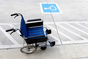 Disabled person parking sign with wheelchair