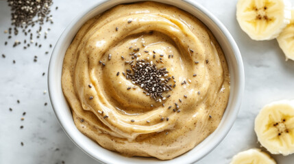 Creamy banana and peanut butter mixture topped with chia seeds