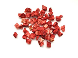 Dried portion of yummy strawberries on a bright background.