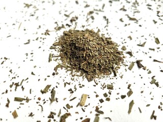 Little tarragon leaves on a white background.