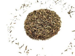 Aromatic portion of dried thyme, on a white background.