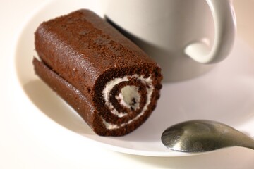 chocolate rolls on a white plate