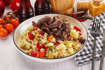 Traditional couscous with beef and vegetables