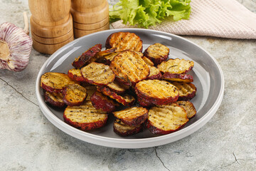 Baked red batat slices with herbs