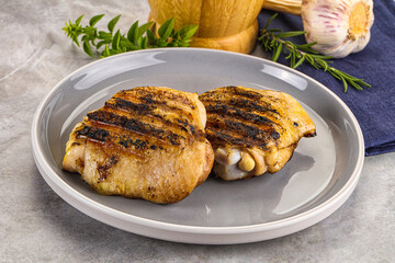 Two Tasty grilled chicken thighs