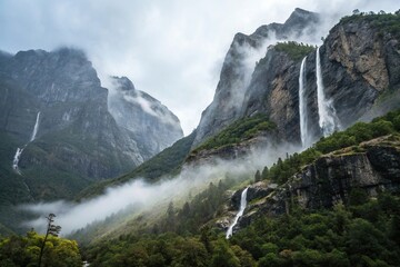 Misty mountain range with fog and waterfalls, stream, dramatic