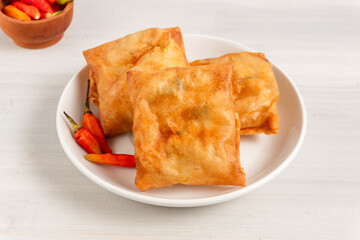 Martabak Tahu or Tofu Spring Rolls. Is traditional snacks in Indonesia.perfect for recipe, article, catalogue, or any commercial purposes. with copy space.