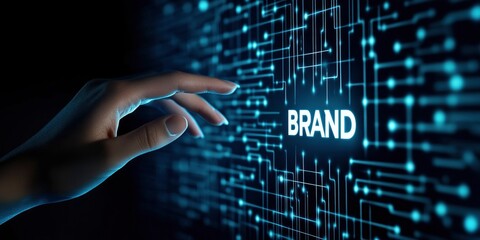 futuristic technology concept for brand identity, Hand touching a digital screen with glowing blue pattern and text BRAND written on it