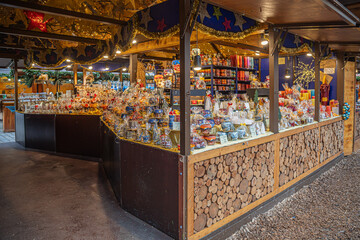 Christmas Market (german:Weihnachtsmarkt) and Advent Feast in Schloßplatz (Schloß square), in center of city. Market stalls with food, sweets, gifts and crafts, Erlangen, Germany