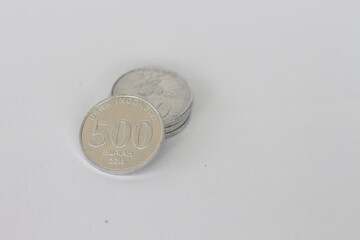 Silver coins stacks isolated on a white background. Indonesian rupiah coin. 500 rupiah coin. metal money