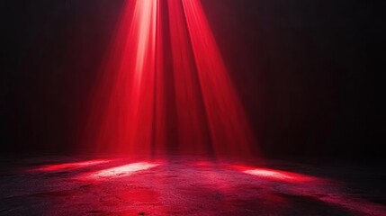 Obraz premium Red Light Spotlight on Dark Background