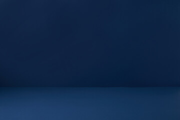 the dark navy background is divided