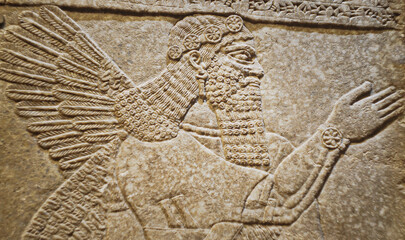 Close-up view on Winged Figure. Architectural Fragment Of Panel From Northwest Palace Of...
