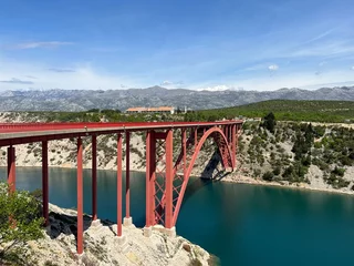 The Maslenica Bridge, a deck arch bridge carrying the D8 state road spanning Novsko Zdrilo strait (Croatia) - Stari Maslenički most, lučni čelični most preko Novskog ždrila na Jadranskoj magistrali