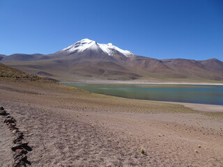 Laguna Miscanti near San Pedro de Atacama. Scenic nature landscape with altitude lake and mountains in the altiplano, in Chile, South America. 