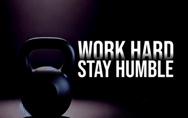 Motivational fitness poster featuring the quote "Work Hard, Stay Humble" with a kettlebell on a dark background. Ideal for gym and workout inspiration.