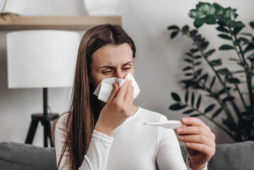 Health care with disease, pandemic virus. Sick influenza young woman tired have fever and sore...