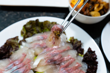yellowtail sashimi on the table