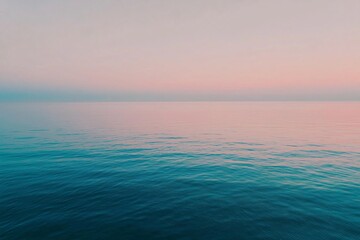 Obraz premium Tranquil Sea at Dawn: A Serene Ocean Experience