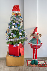 christmas tree with gifts celebrating traditional chrismas