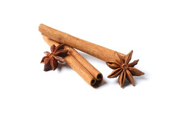 Aromatic cinnamon sticks and anise stars on a white background