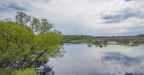 Obraz premium Calm lake with trees in the background