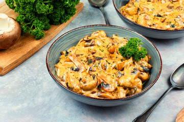 Fried mushrooms in a creamy sauce.