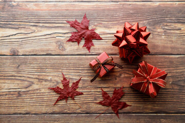 Assorted artisanal gift boxes on wooden background.