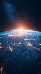 The sun rises over the edge of the Earth as seen from space