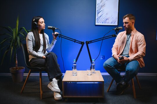 Show host interviewing woman during live stream, talking about fashion and style trends, disagreeing with her opinions. Man arguing with social media celebrity, recording podcast