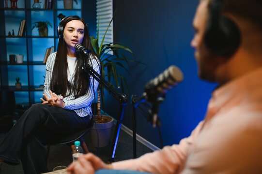 Show host interviewing woman during live stream, talking about fashion and style trends, disagreeing with her opinions. Man arguing with social media celebrity, recording podcast