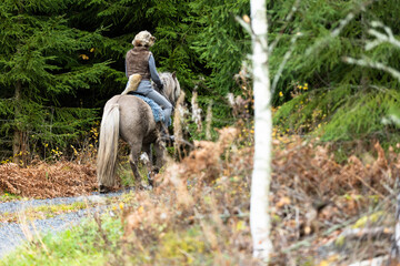 Icelandic horse riding. Rider has werewolf theme outfit