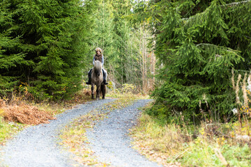 Icelandic horse riding. Rider has werewolf theme outfit