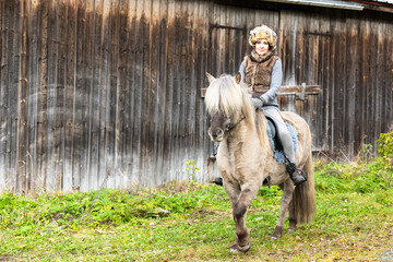 Icelandic horse riding. Rider has werewolf theme outfit