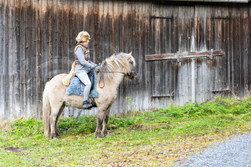 Icelandic horse riding. Rider has werewolf theme outfit