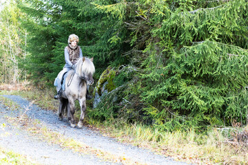 Icelandic horse riding. Rider has werewolf theme outfit